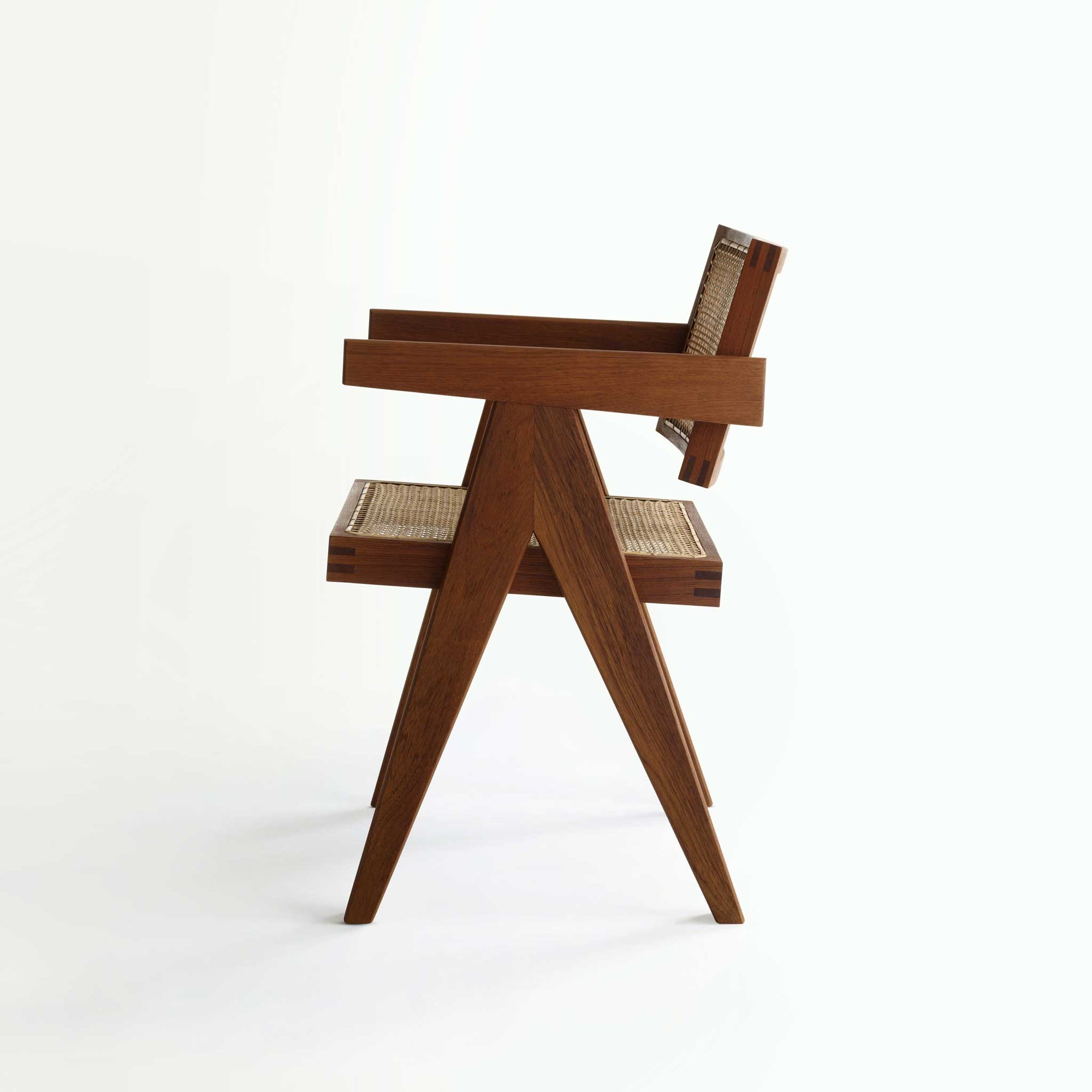 Side-view-of-teak-wood-high-quality-design-chair-furniture-pierre-jeannerett-handwoven-rattan-webbing