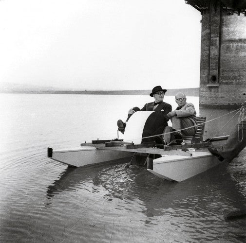 Black-and-white-image-of-Pierre-Jeanneret-and-Le-Corbusier-in-pedal-boat-on-lake-in-Chandigarh-in-1950's