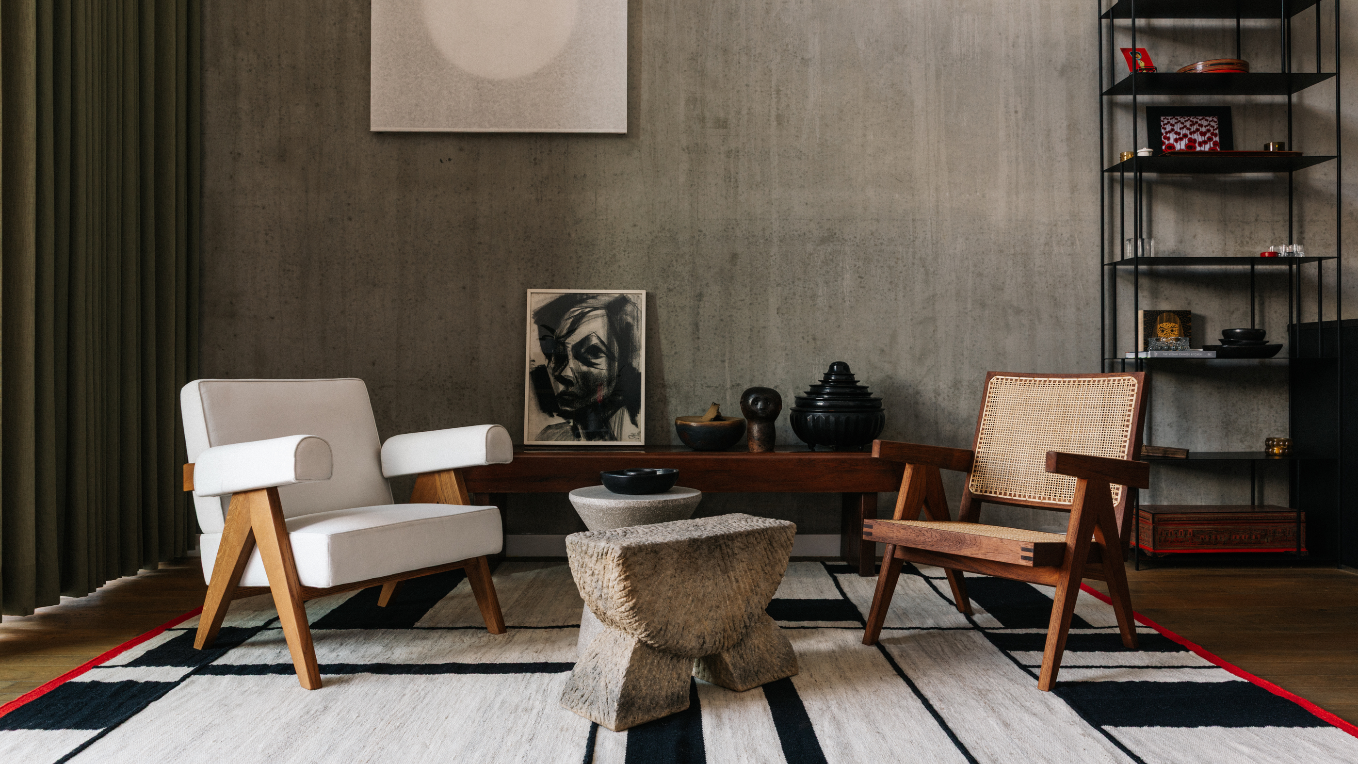 Modern living room with stylish Pierre Jeanneret furniture and Japandi Decor