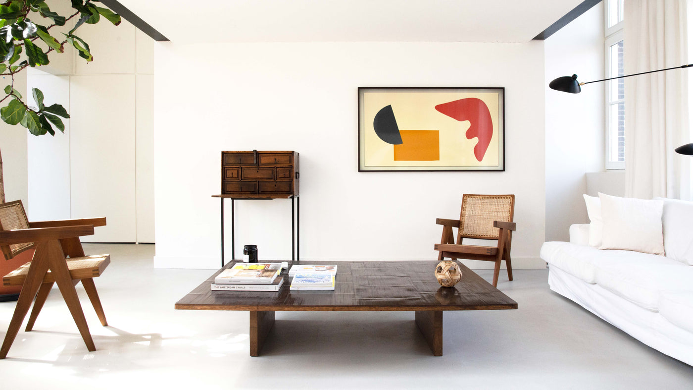 Pierre Jeanneret lounge chair in modern interior